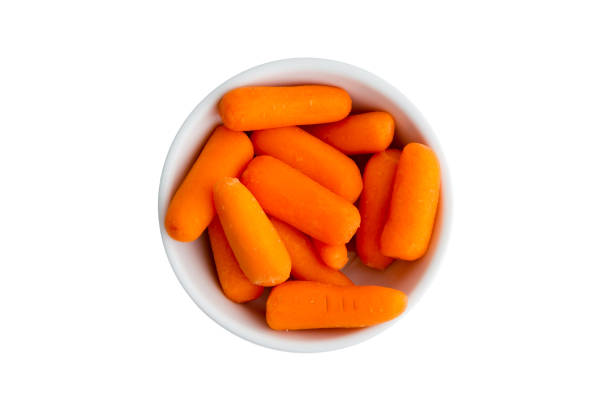 istock Bowl of fresh baby carrots viewed from above 1048852020