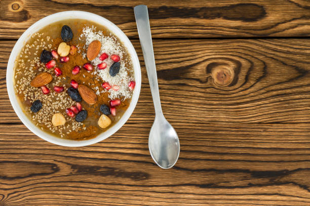 istock Bowl with delicious asure dessert on wooden table 1048852084