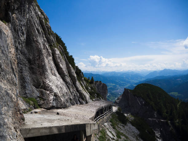 istock Mountain and path to reach the ice cave. 1048853012