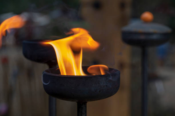 istock Iron garden torch with blazing flame 1048855660