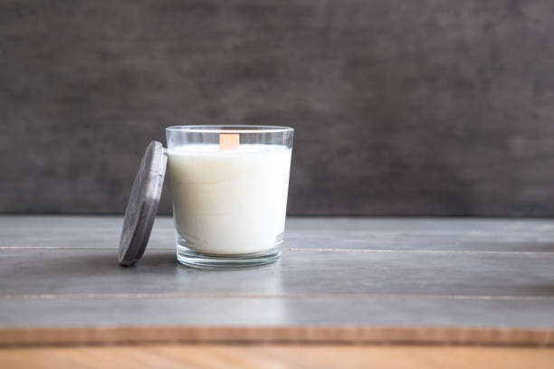 istock Concrete scented soy round candle on grey table 1048856062