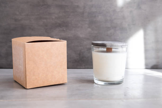 istock Concrete scented soy round candle on grey table 1048856074