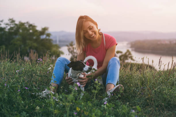 istock Woman with her dog Jack Russell Terrier 1048856138