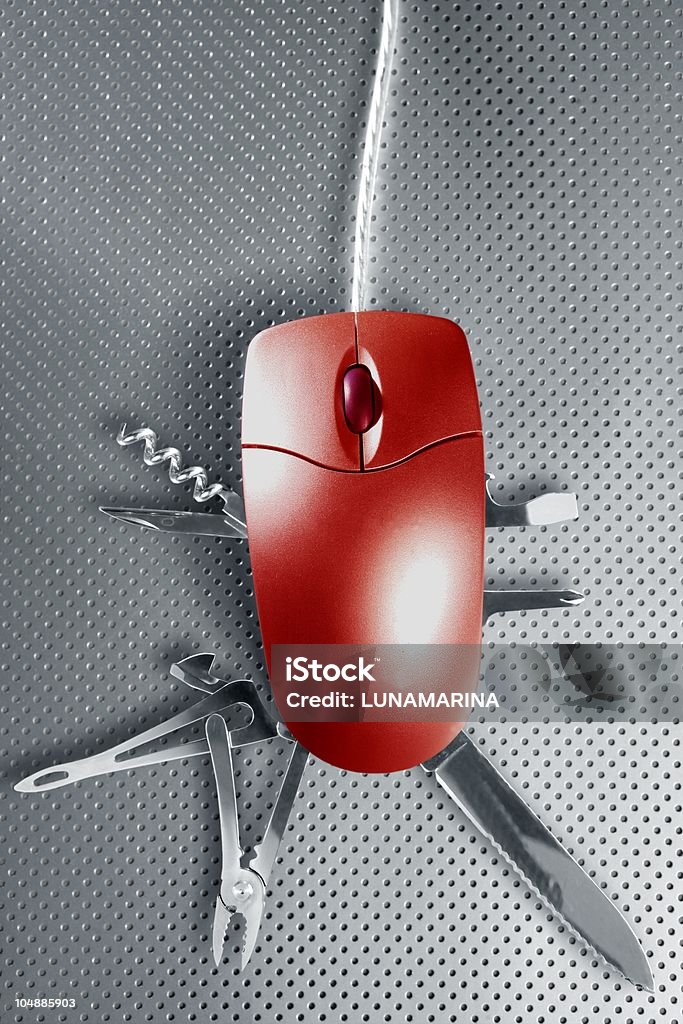 Red mouse multifunction swiss knife metaphor Red mouse metaphor pretending to be a Swiss multifunction knife Penknife Stock Photo