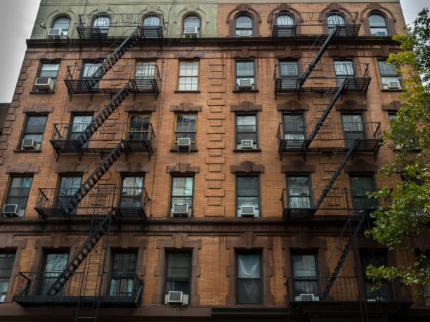 View of fire escape outside red brick New York apartment