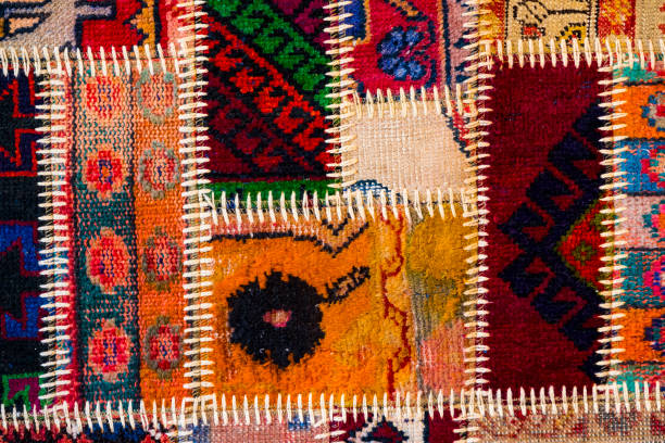 istock Texture of a piece of old carpet 1048860536