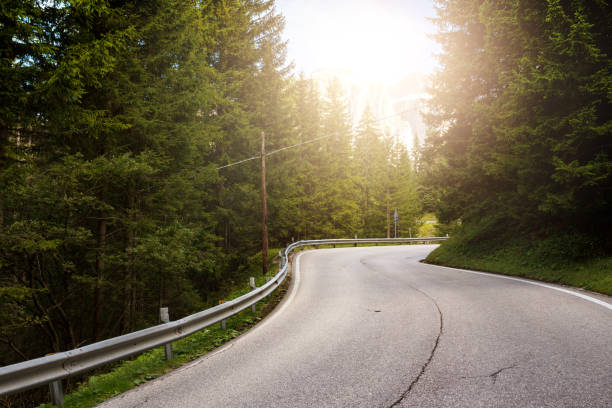 istock Mountain road at the mountains Dolomites, Italy 1048866532