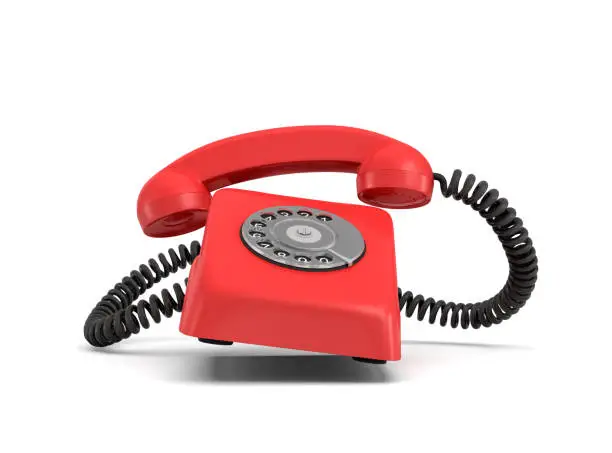 Photo of 3d rendering of a red retro phone with a round rotary dial that rings with the phone itself and the handle lifted up