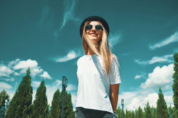 istock Happy young woman enjoying vacation 1048881930