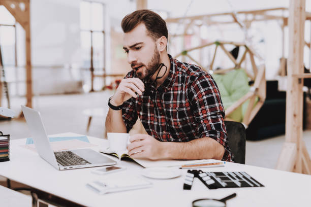 istock Inspiration. Laptop Screen. Cup of Coffee. Desk. 1048882724