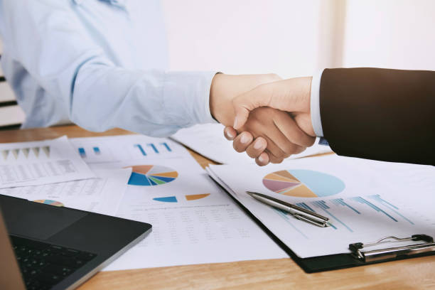 istock businessman shake hand in office 1048883110