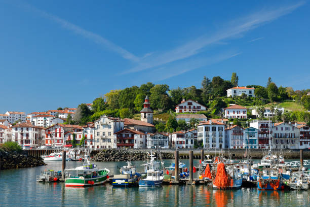 Ciboure and Harbor of Saint Jean de Luz, France Harbor for fishing boats in Saint Jean de Luz. Ciboure in the background. french basque country photos stock pictures, royalty-free photos & images