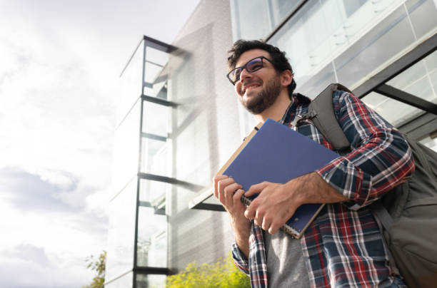 istock Happy male student at the university 1048886540