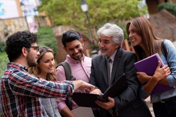 istock Students talking to the teacher at the university 1048886554