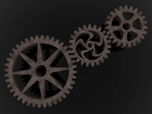 istock Three metal gears on black background 1048887876