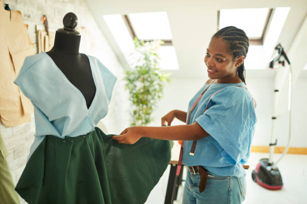 istock Female Fashion Designer In Her Workshop 1048890638