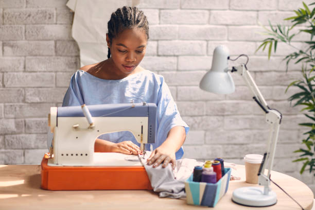 istock Female Fashion Designer In Her Workshop 1048890928