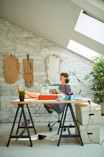 istock Female Fashion Designer In Her Workshop 1048891572