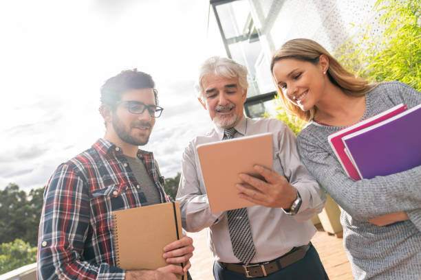 istock Students talking to the teacher at the university 1048896966