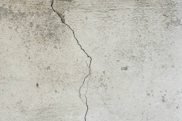istock Wall fragment with attritions and cracks 1048903240