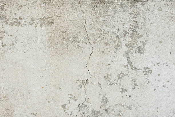 istock Wall fragment with attritions and cracks 1048903320