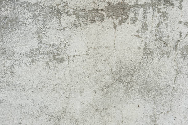 istock Wall fragment with attritions and cracks 1048903432