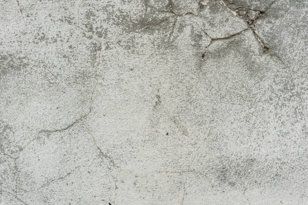 istock Wall fragment with attritions and cracks 1048903506