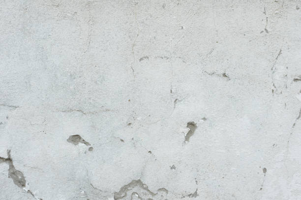 istock Wall fragment with attritions and cracks 1048903564