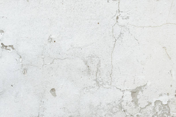 istock Wall fragment with attritions and cracks 1048903656