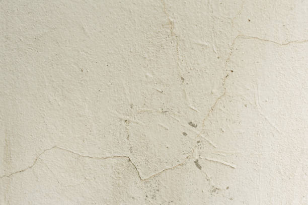 istock Wall fragment with attritions and cracks 1048904232