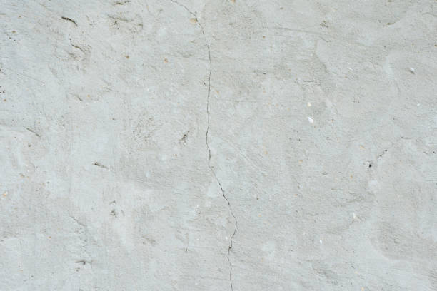 istock Wall fragment with attritions and cracks 1048906634