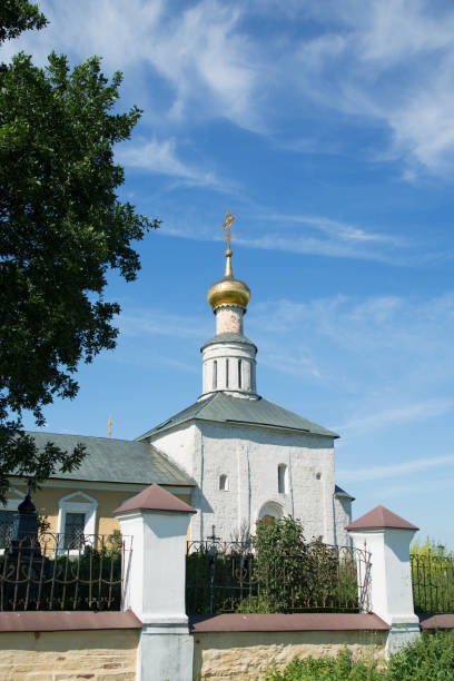 istock Russian Orthodox Church against a blue sky with clouds in the summer 1048907080