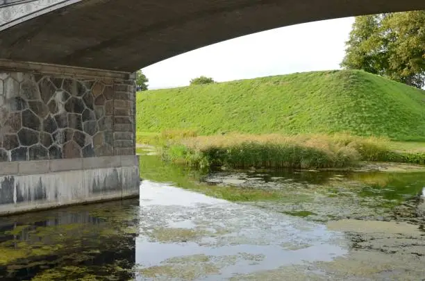 Grass area under the bridge in area to surround Kastellet, an old fortress in Copenhagen, Denmark.