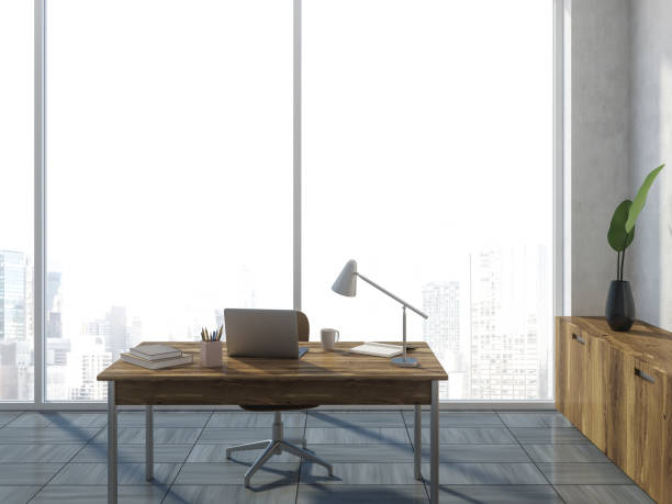 istock White and wooden loft office workplace interior 1048916520