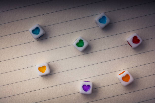 istock Colorful cubes with a heart  on paper 1048918316