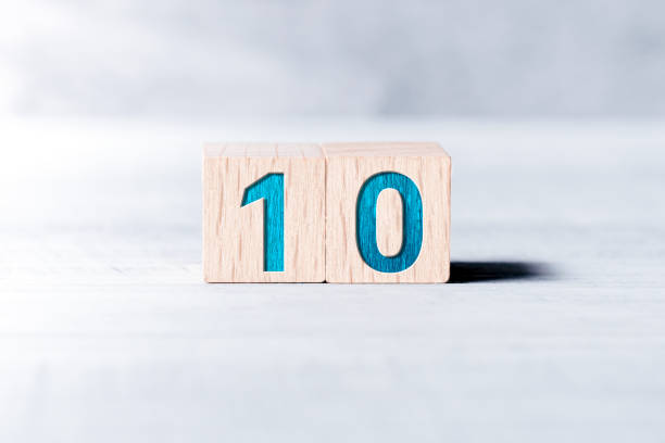Number 10 Formed By Wooden Blocks On A White Table stock photo