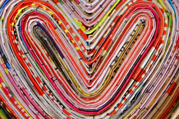 hearts  - abstract newspaper macro heart shape stock-fotos und bilder