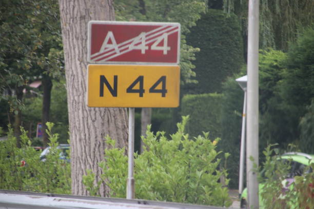 istock Signs along the motorway in Wassenaar that motorway A44 stops and will continue as regional road N44 in the Netherlands 1048954976