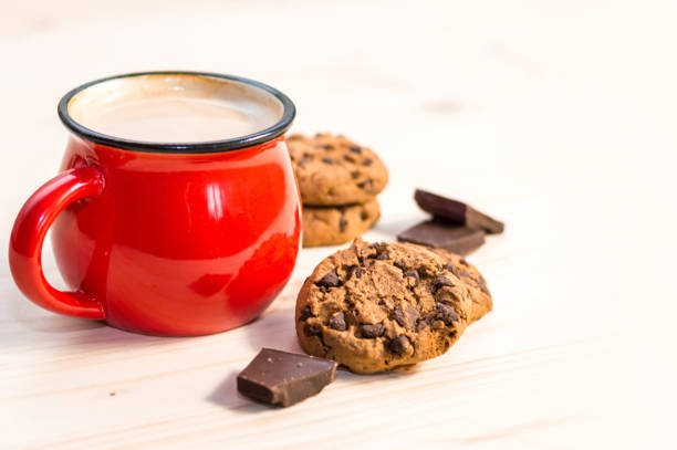 istock Chocolate cookies and hot drink 1048958678