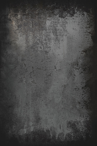 Black  grunge metal textured wall background with scratches.