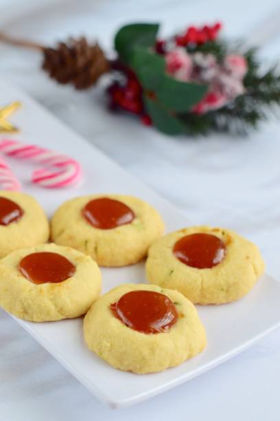 istock Homemade thumbprint cookies with raspberry jam 1048963222