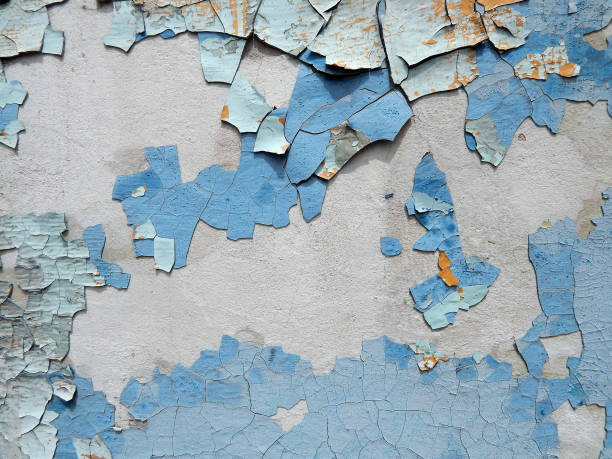 istock old wall stucco with scratches and cracks. Textured background 1048977472