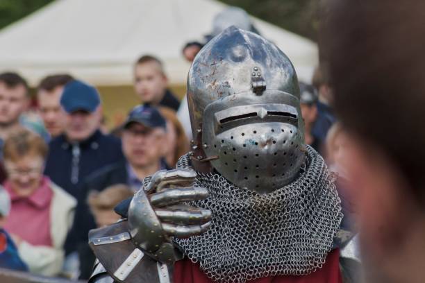 istock knight in armor with a metal glove 1048982440