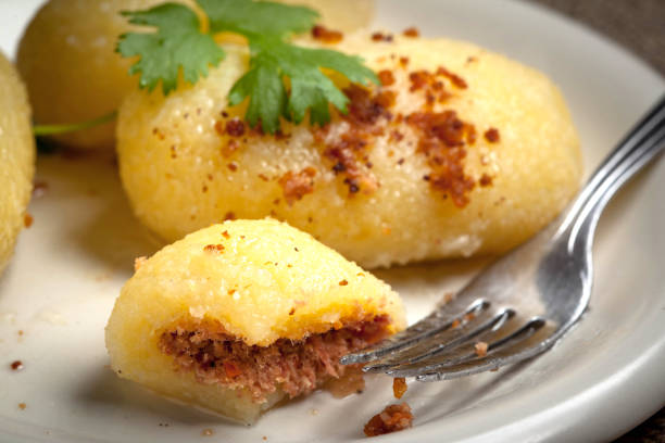 istock Potato dumplings stuffed with minced meat. 1048983826