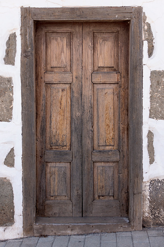 Old brown wooden door in Las Palmas, Gran Canaria, Spain