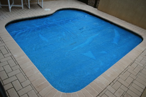 Home private swimming pool with cover on