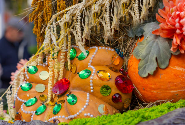 istock Autumn composition with pumpkins in gift wrapping. 1048995876