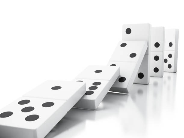 istock 3d Domino tiles falling in a row 1048996894