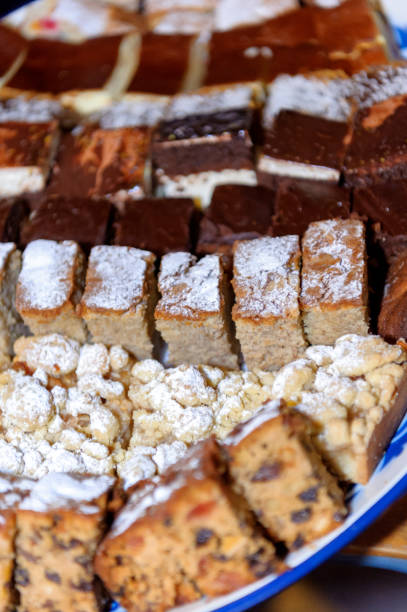 istock Cakes - pieces of cakes on a plate 1048998832