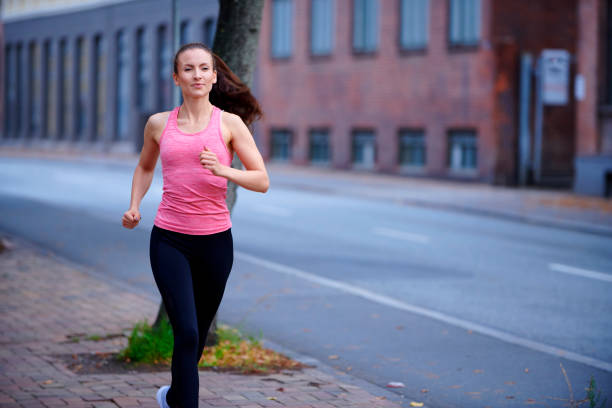 istock Lifestyle running in the street 1048999214
